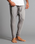 Male modeling Deep Clay colored pants