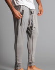 Male modeling Silver Lining colored pants