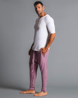 Male modeling Dusty Rose colored pants