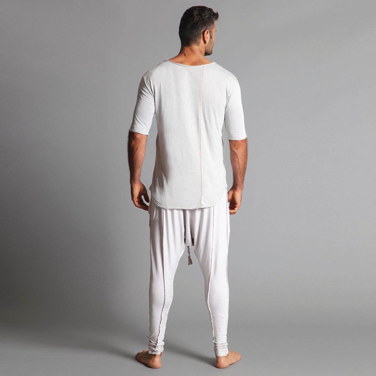 Male modeling White Stone colored pants