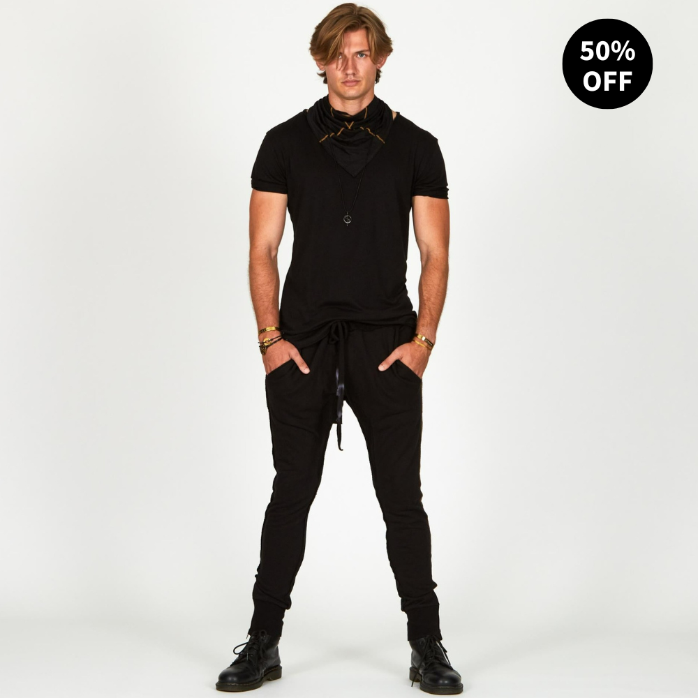 Man modeling the milano pant in black