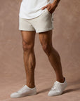 male modeling white stone resort shorts