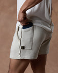 male modeling white stone resort shorts