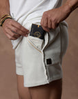 male modeling white stone resort shorts