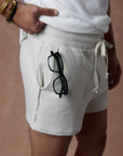 male modeling white stone resort shorts