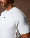 Man modeling a white Short Sleeve Henley