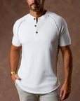 Man modeling a white Short Sleeve Henley