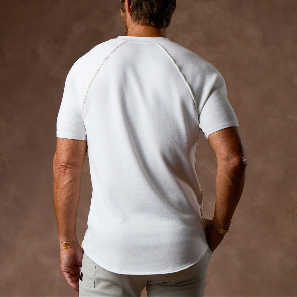 Man modeling a white Short Sleeve Henley