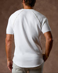 Man modeling a white Short Sleeve Henley