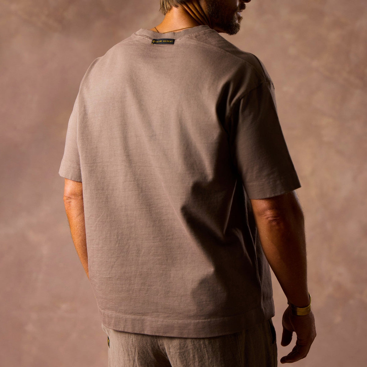 male modeling taupe boxy tee