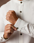 male modeling white shacket