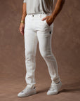 male modeling white elemental slim pants