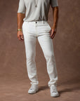 male modeling white elemental slim pants