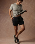 male modeling black resort shorts