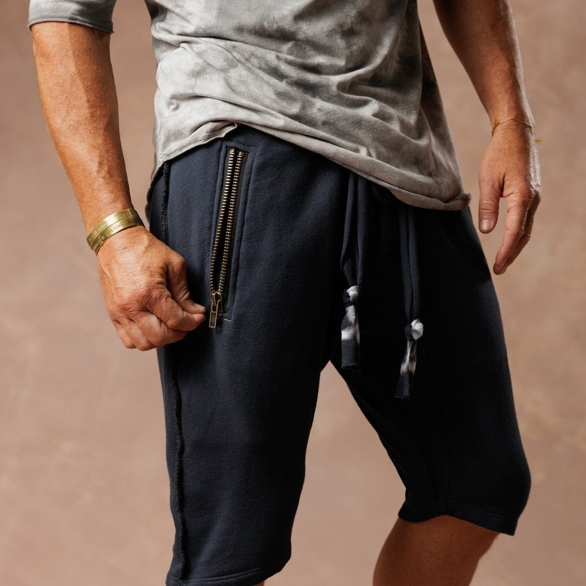 Man modeling milano mids in charcoal blue