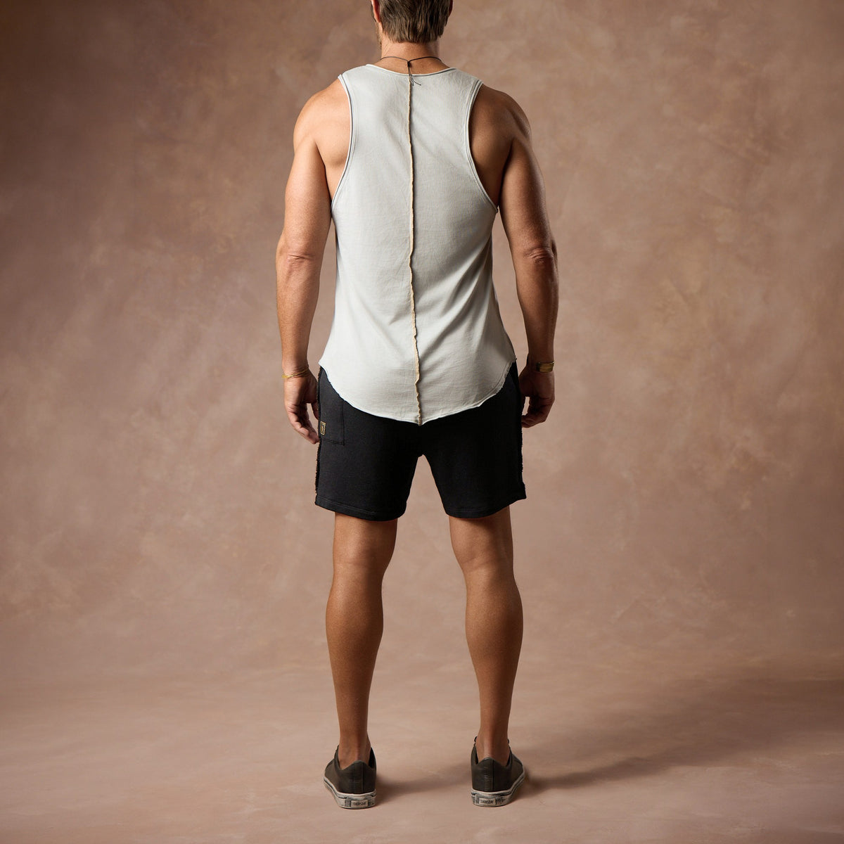 male modeling black resort shorts