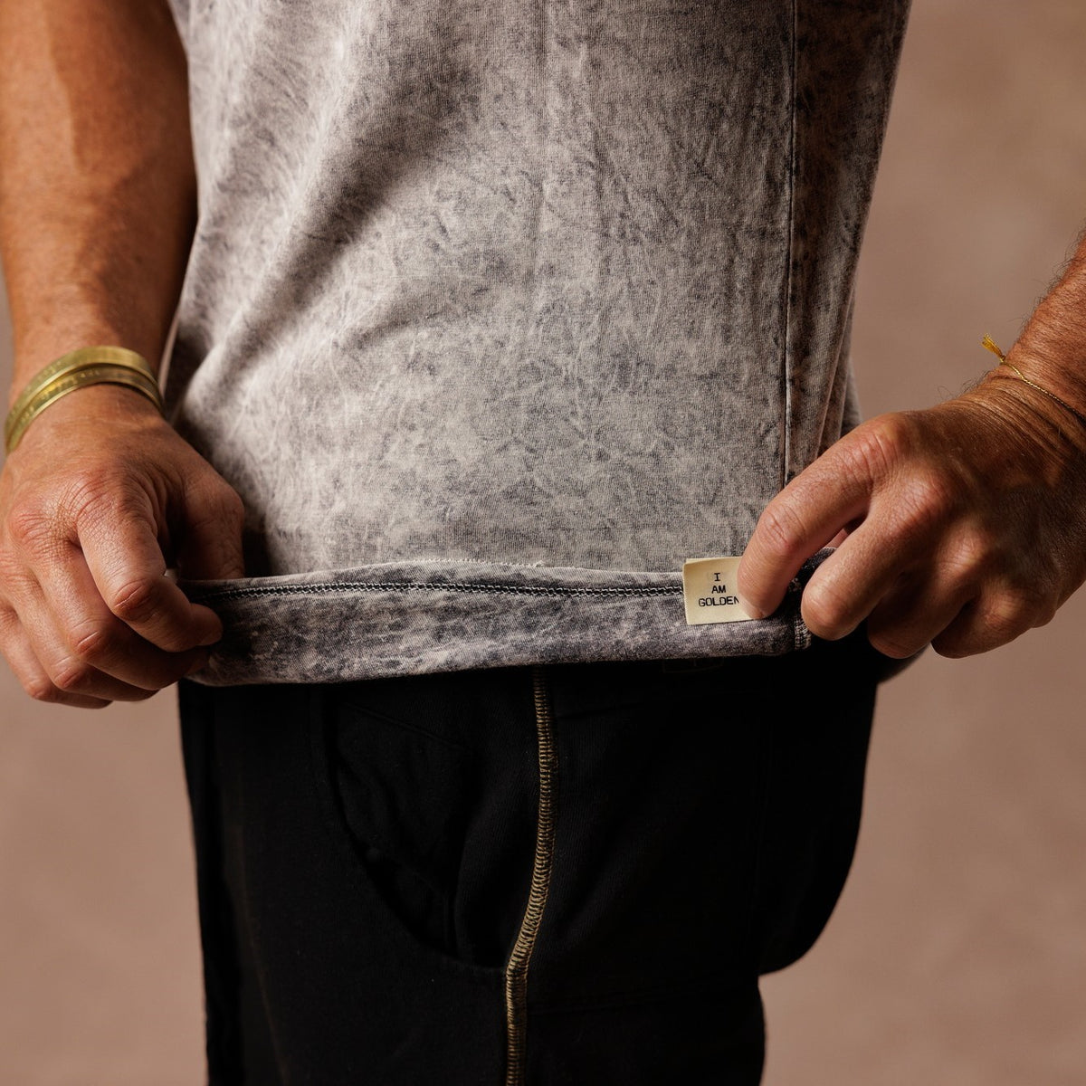 male modeling mineral tank top