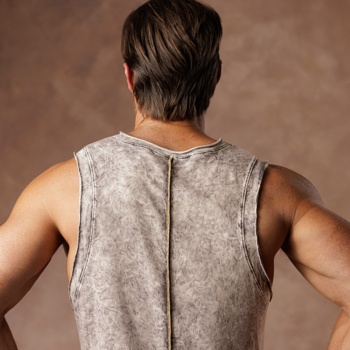 male modeling mineral tank top