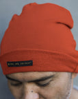 A man modeling the One Golden Thread OG Cloud Beanie in Terra