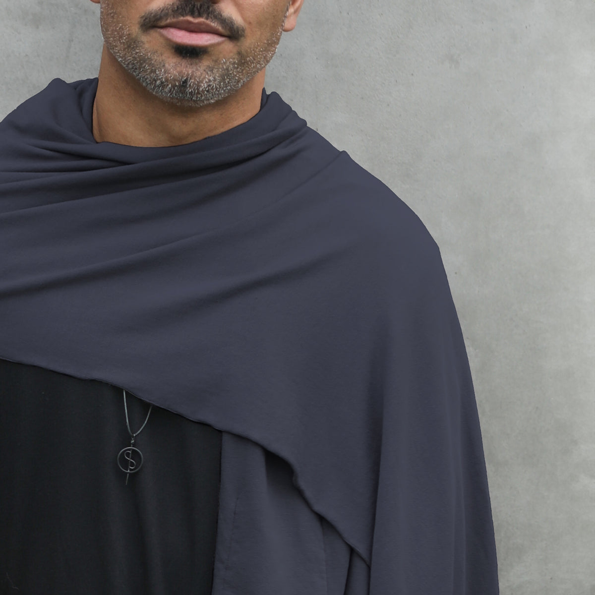 Man modeling blue fleece scarf