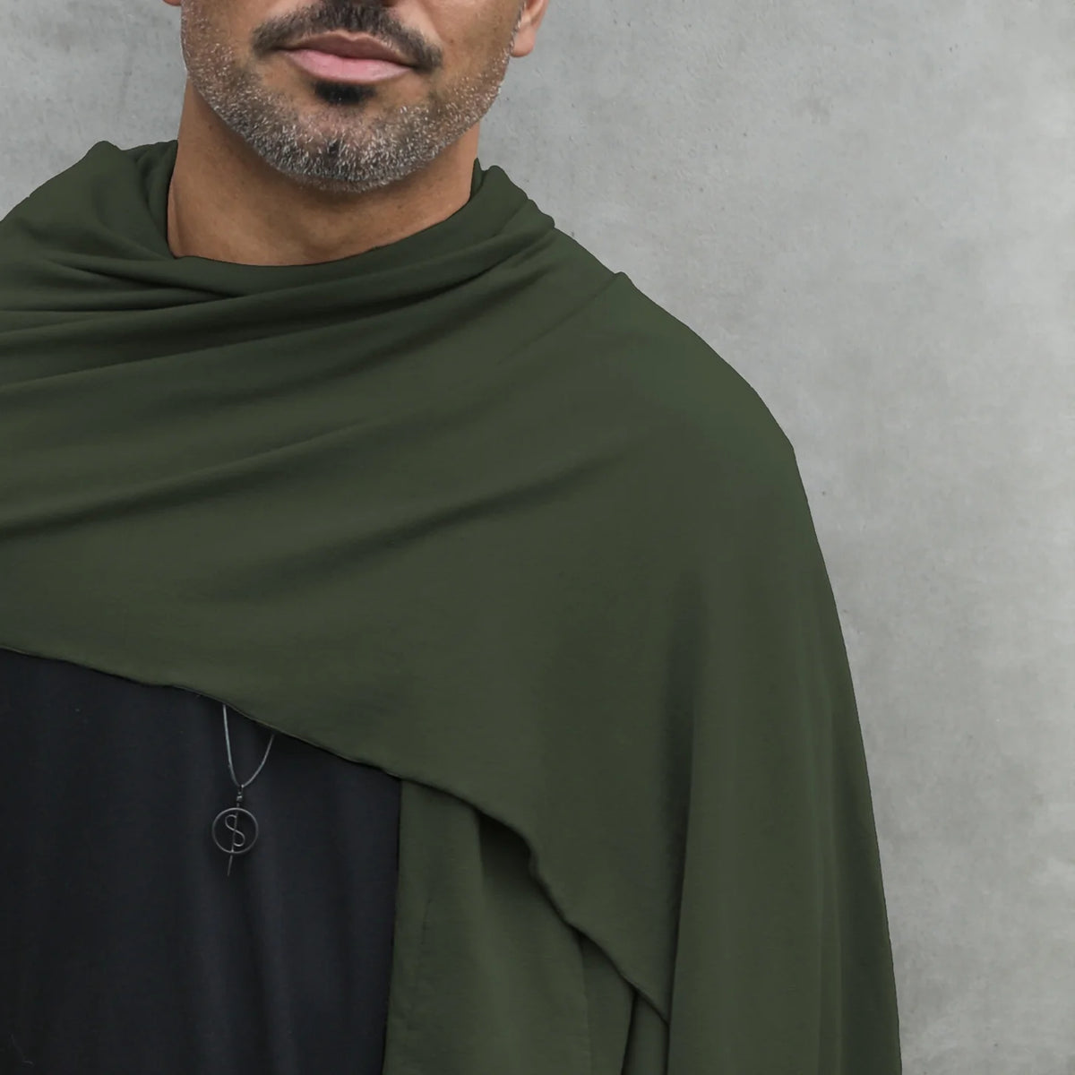 Male modeling green nature fleece scarf