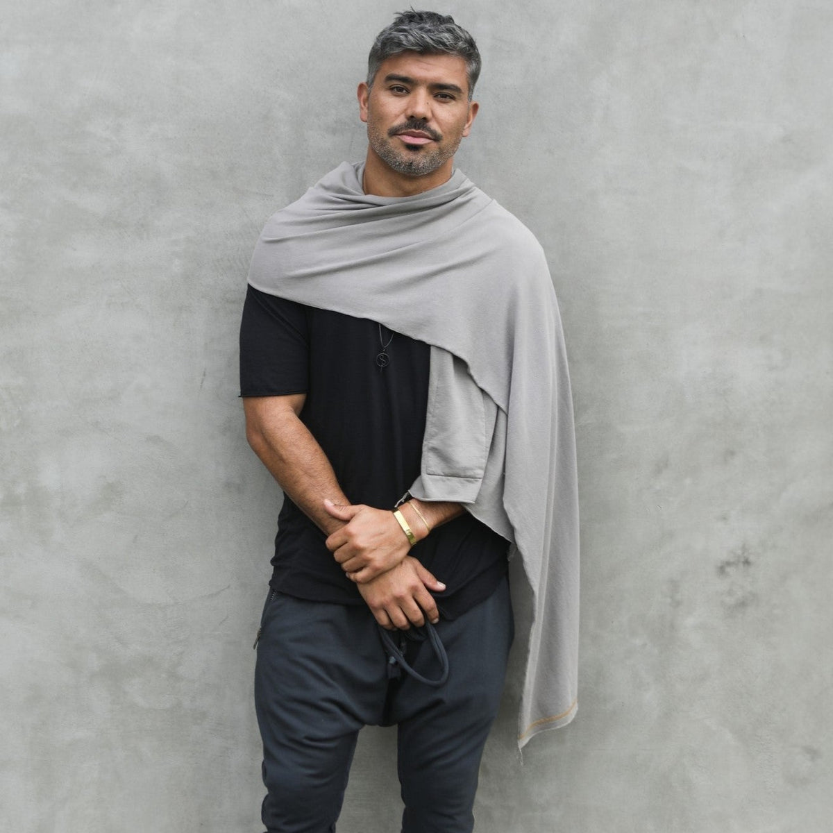 Male modeling grey fleece scarf