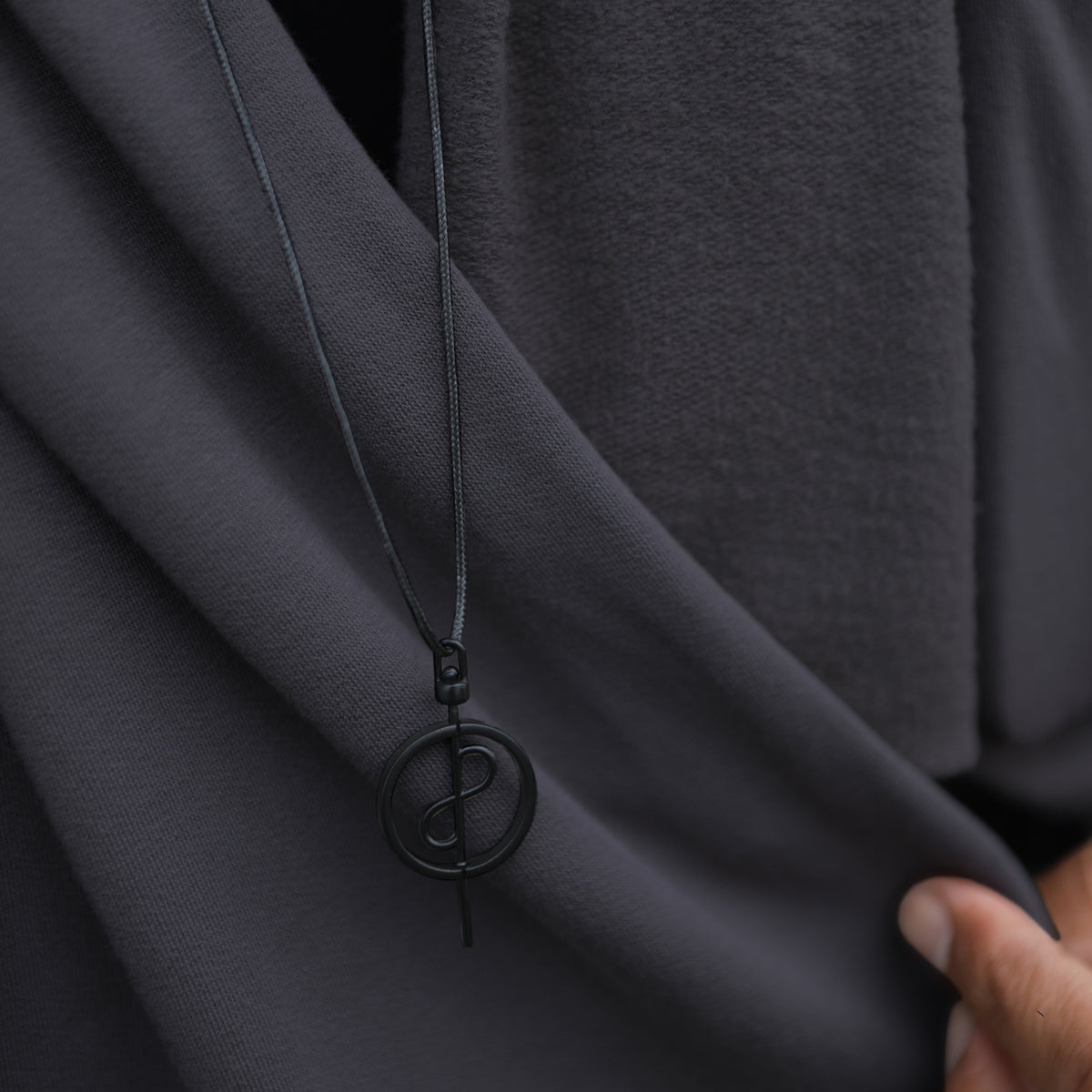 Man modeling blue fleece scarf