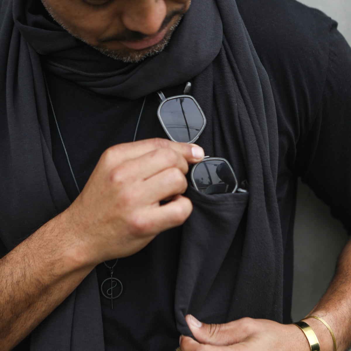 Man modeling slate fleece scarf