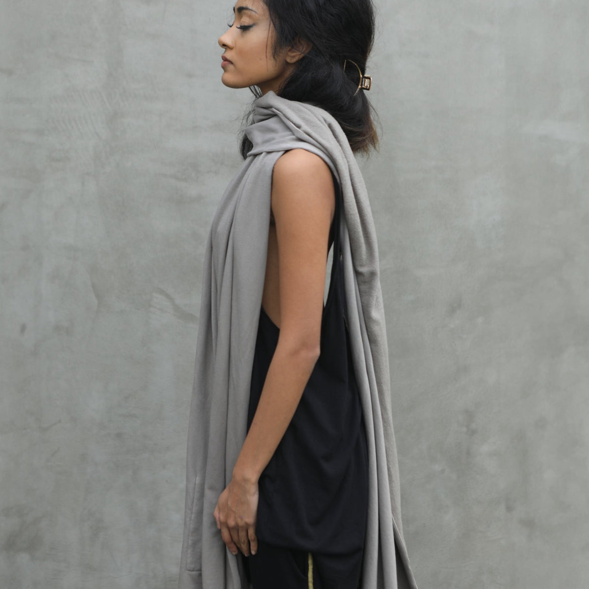 Women modeling grey fleece scarf
