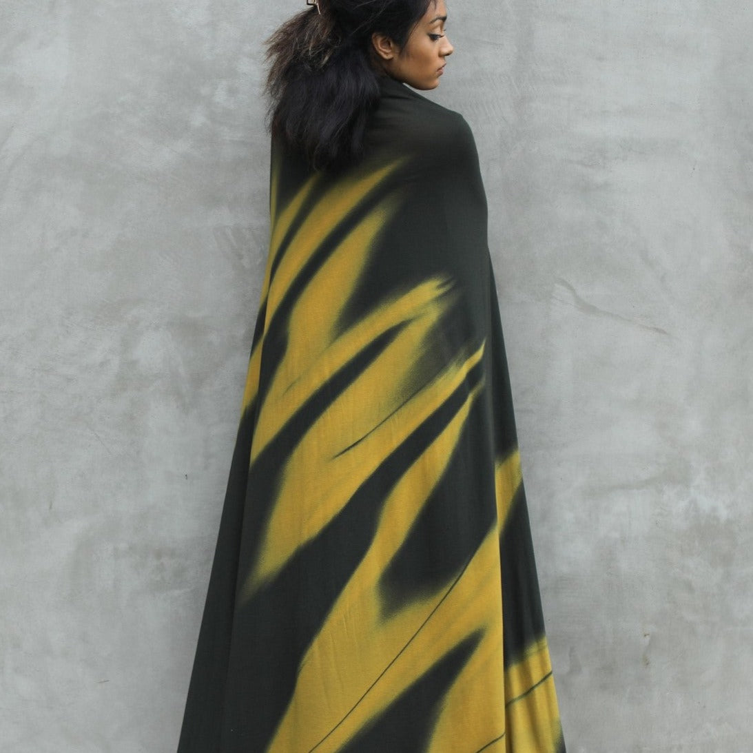 Woman modeling gold Light on Water pattern nature wrap