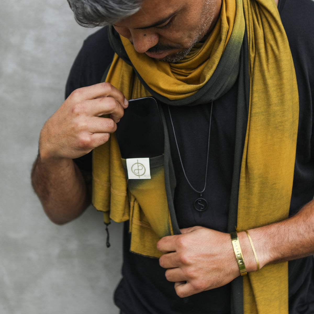 Man modeling gold Light on Water pattern nature wrap