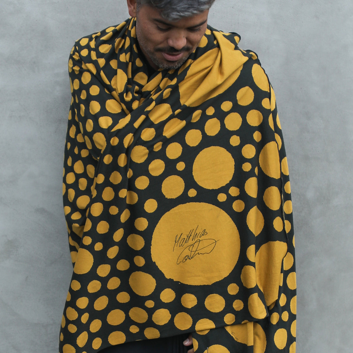man modeling gold fibonacci pattern nature wrap