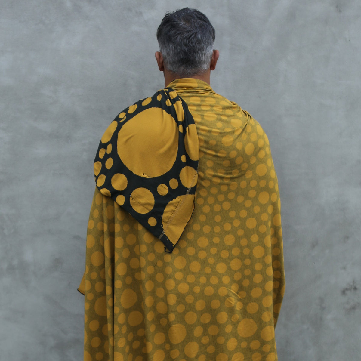 man modeling gold fibonacci pattern nature wrap