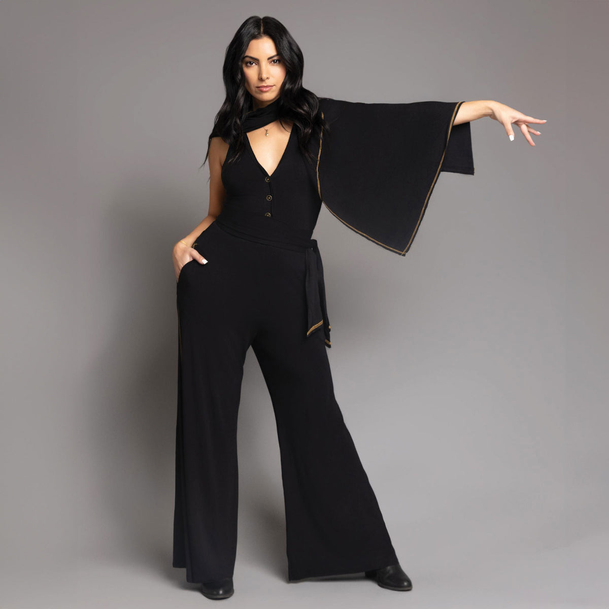 woman modeling the infinite bodysuit in black