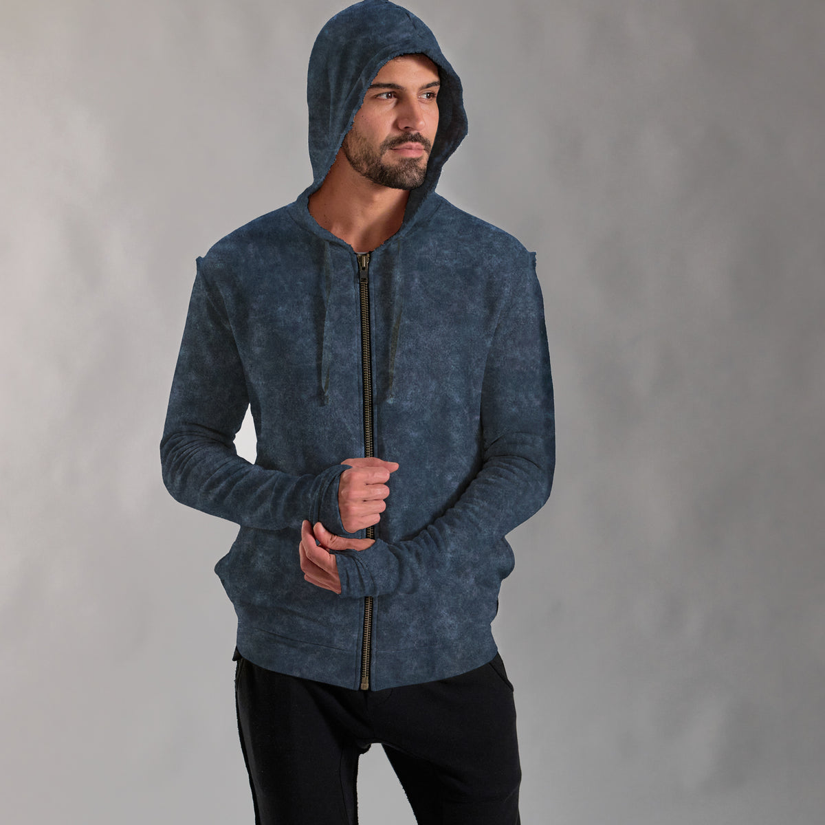 male modeling blue mineral zip hoodie