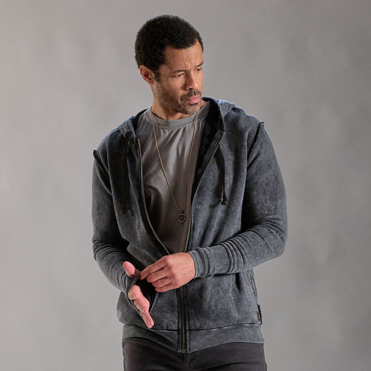 male modeling dark mineral hoodie