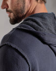 Male modeling charcoal blue hoodie 