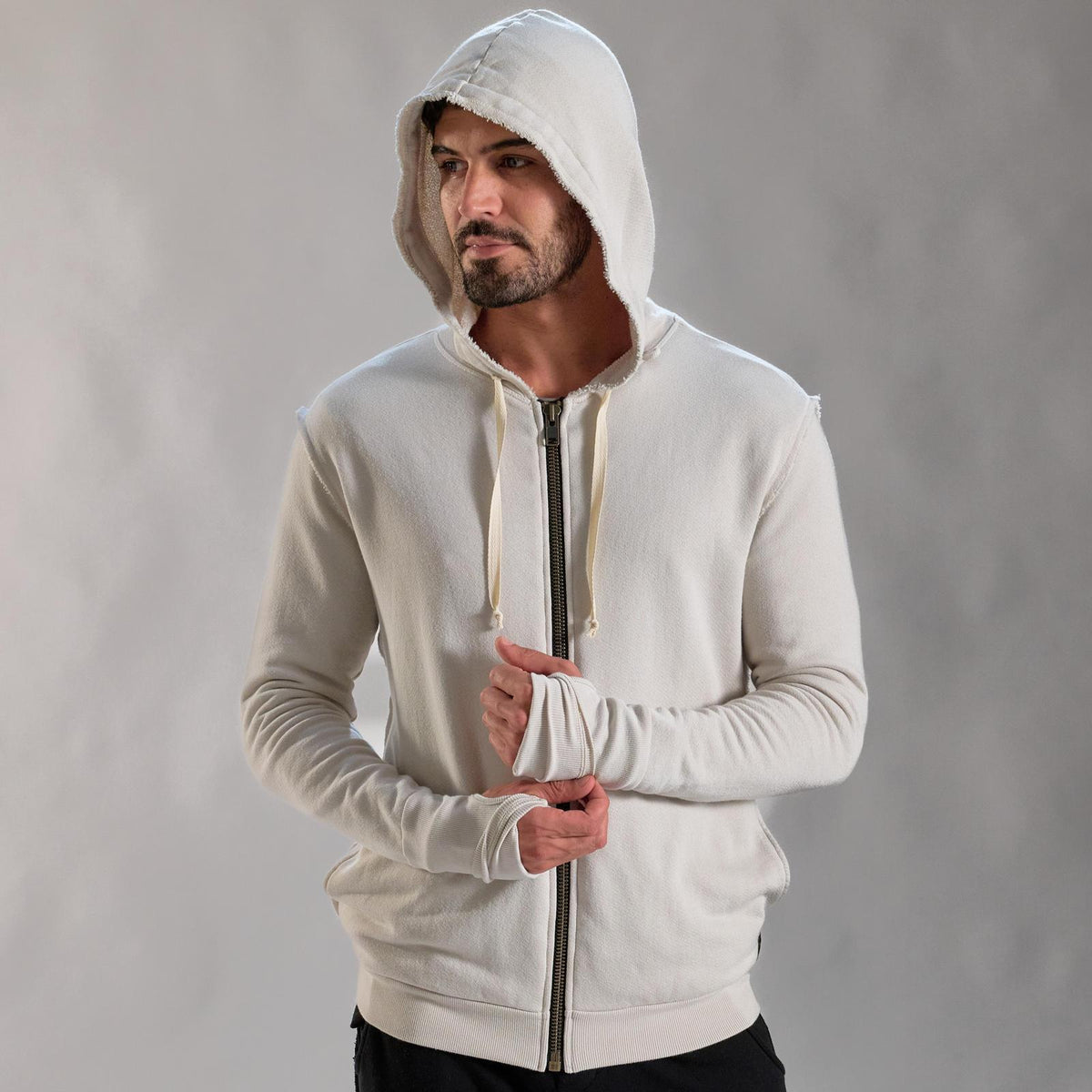 man modeling white stone hoodie