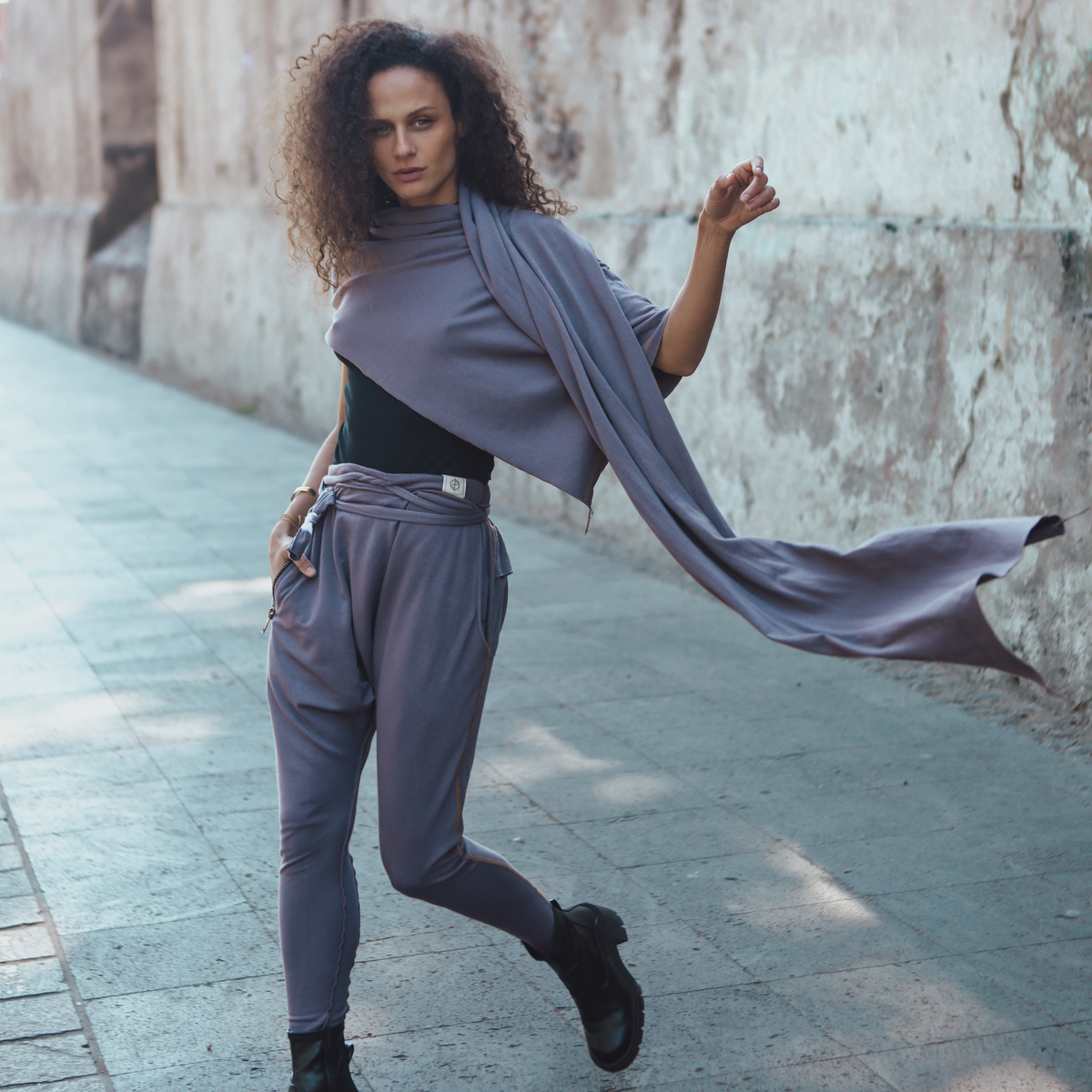 Woman modeling lavender fleece scarf