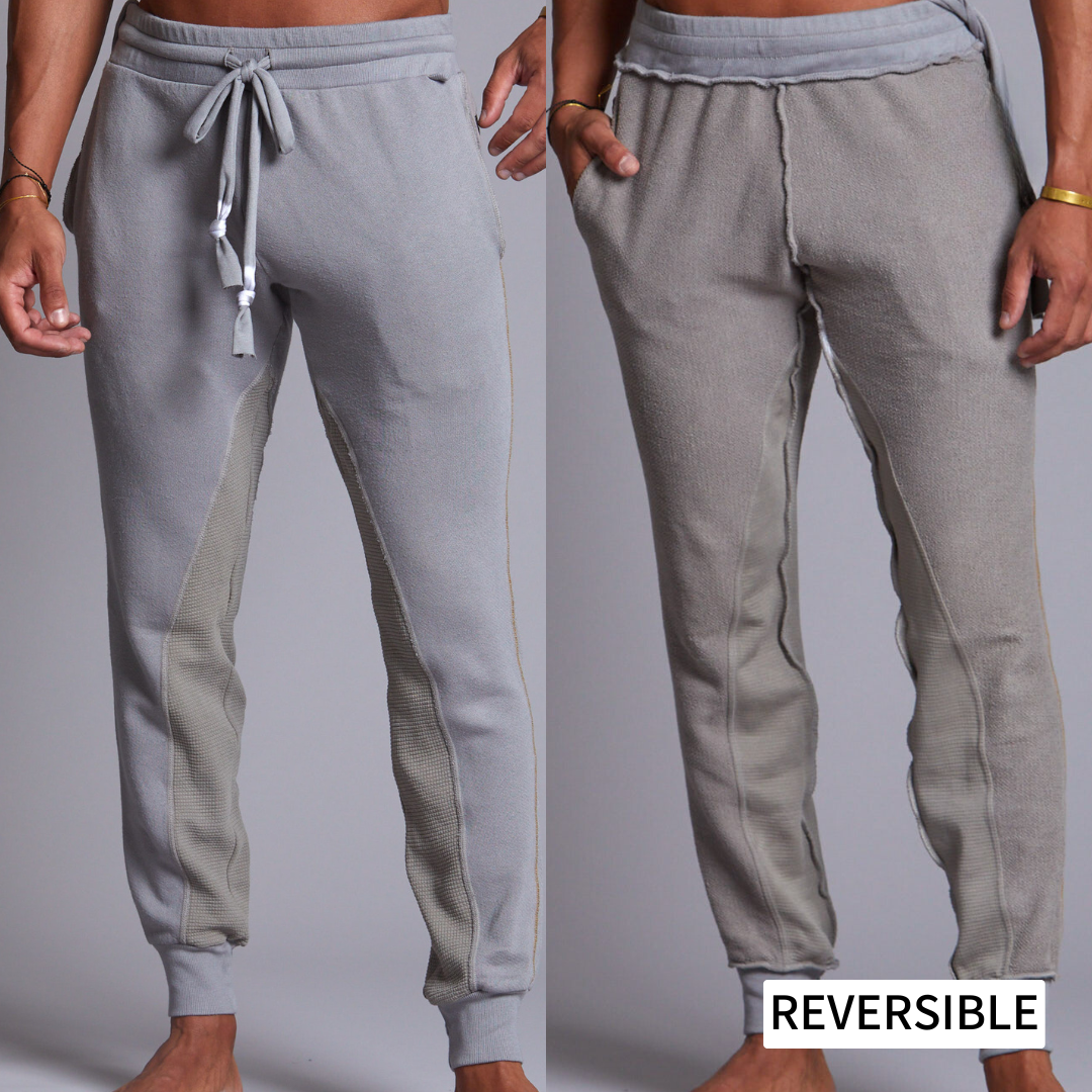 A man modeling Deep Clay gray colored jogger pants