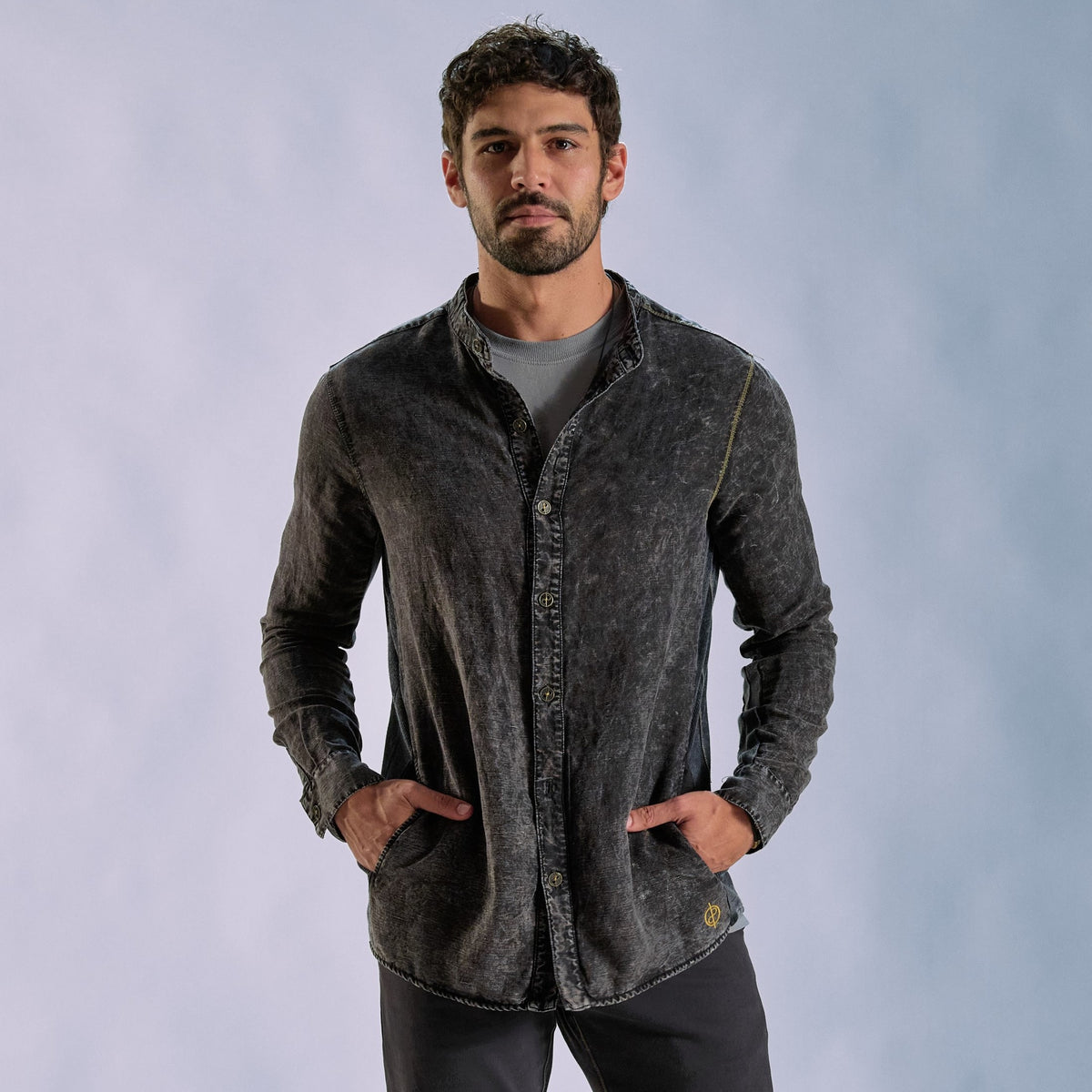 Male modeling dark mineral shacket