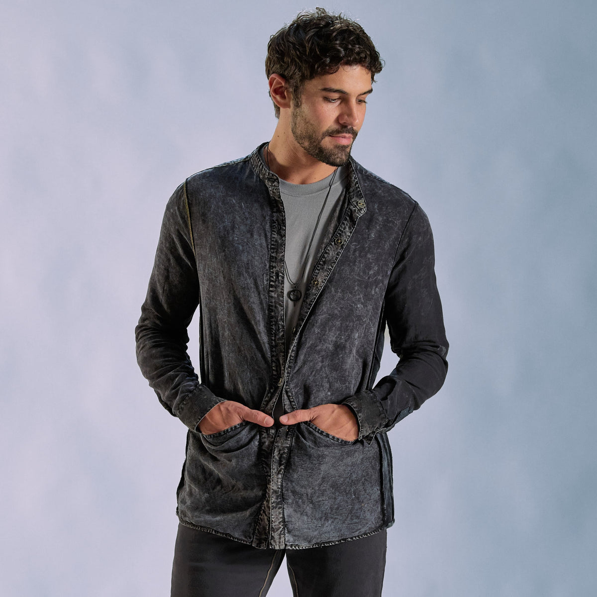 Male modeling dark mineral shacket