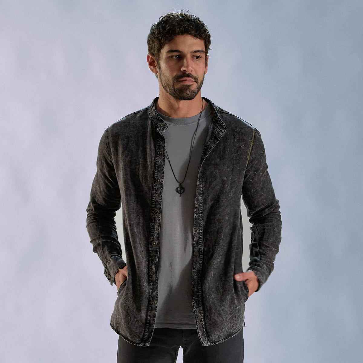 Male modeling dark mineral shacket