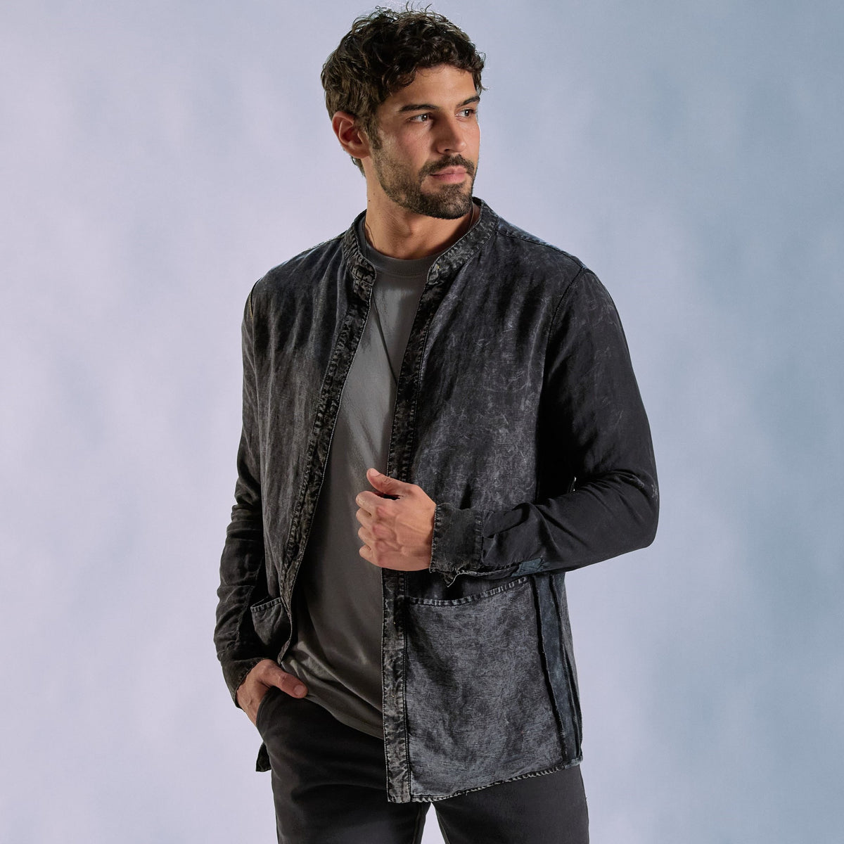 Male modeling dark mineral shacket