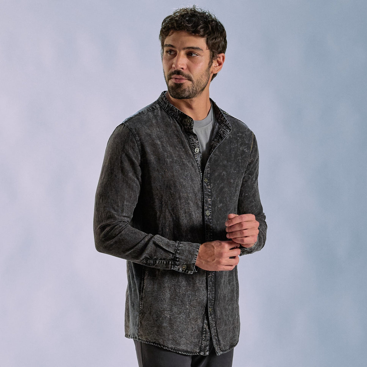 Male modeling dark mineral shacket