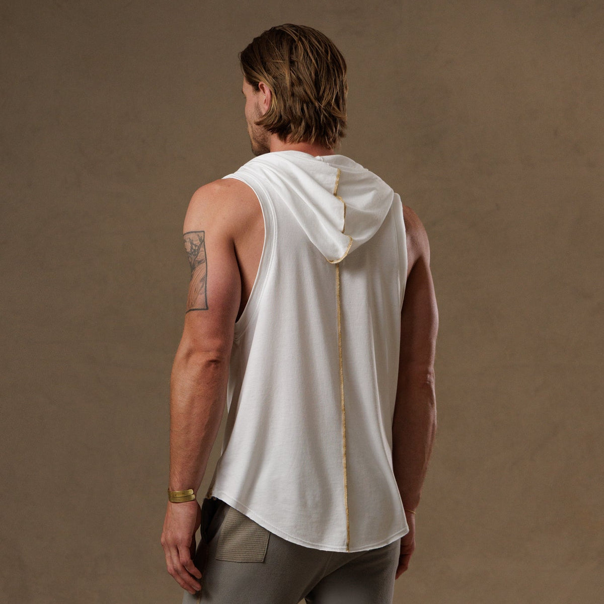 male modeling white hooded tree tank