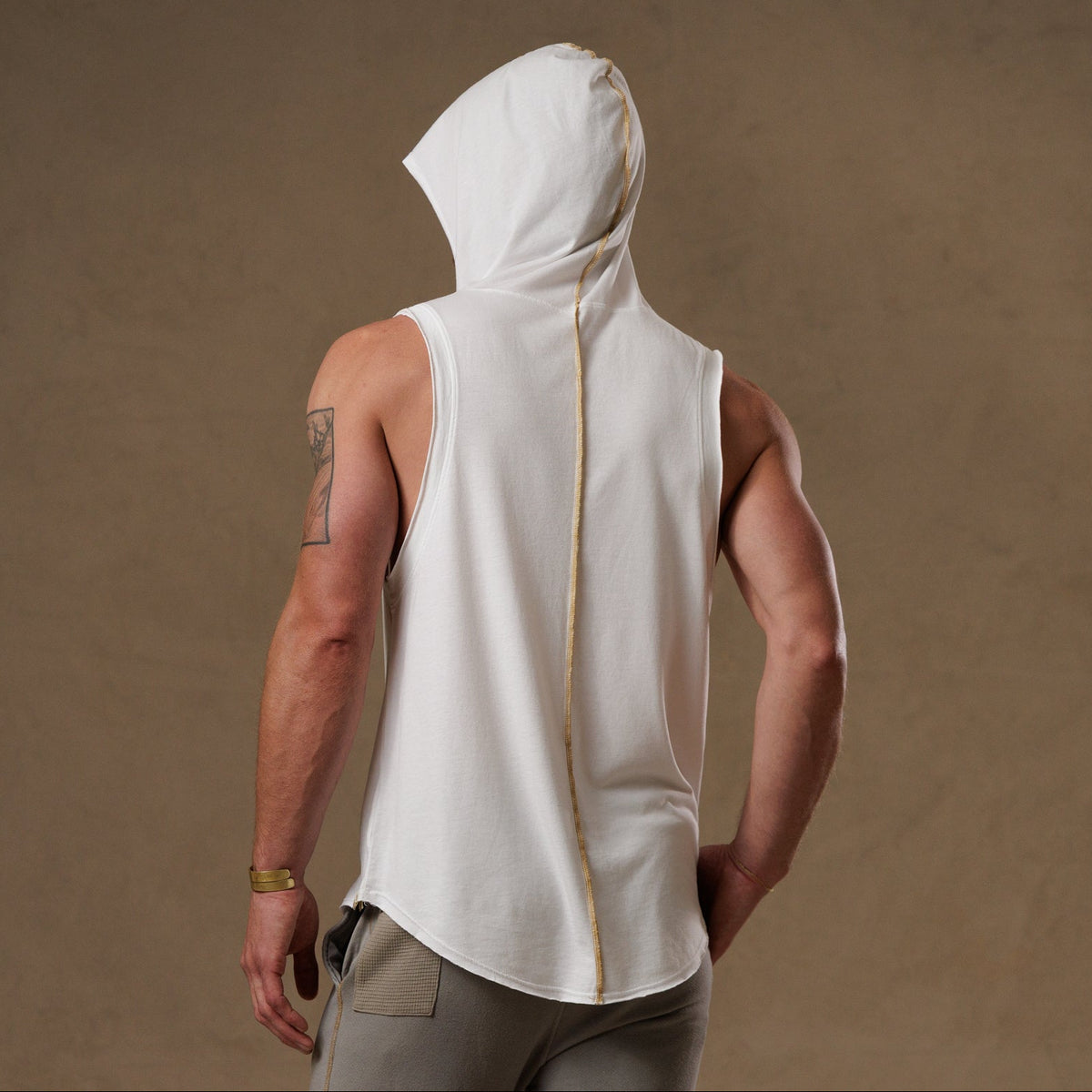 male modeling white hooded tree tank
