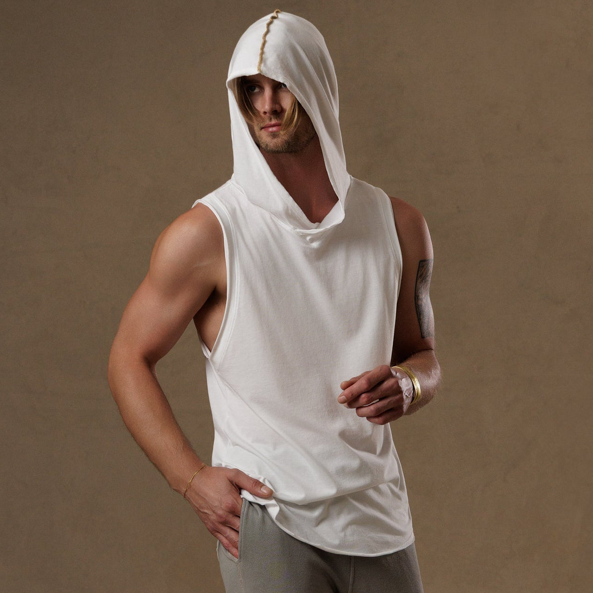 male modeling white hooded tree tank