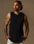 male modeling black hooded tree tank