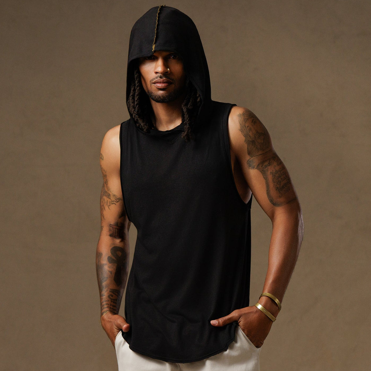 male modeling black hooded tree tank